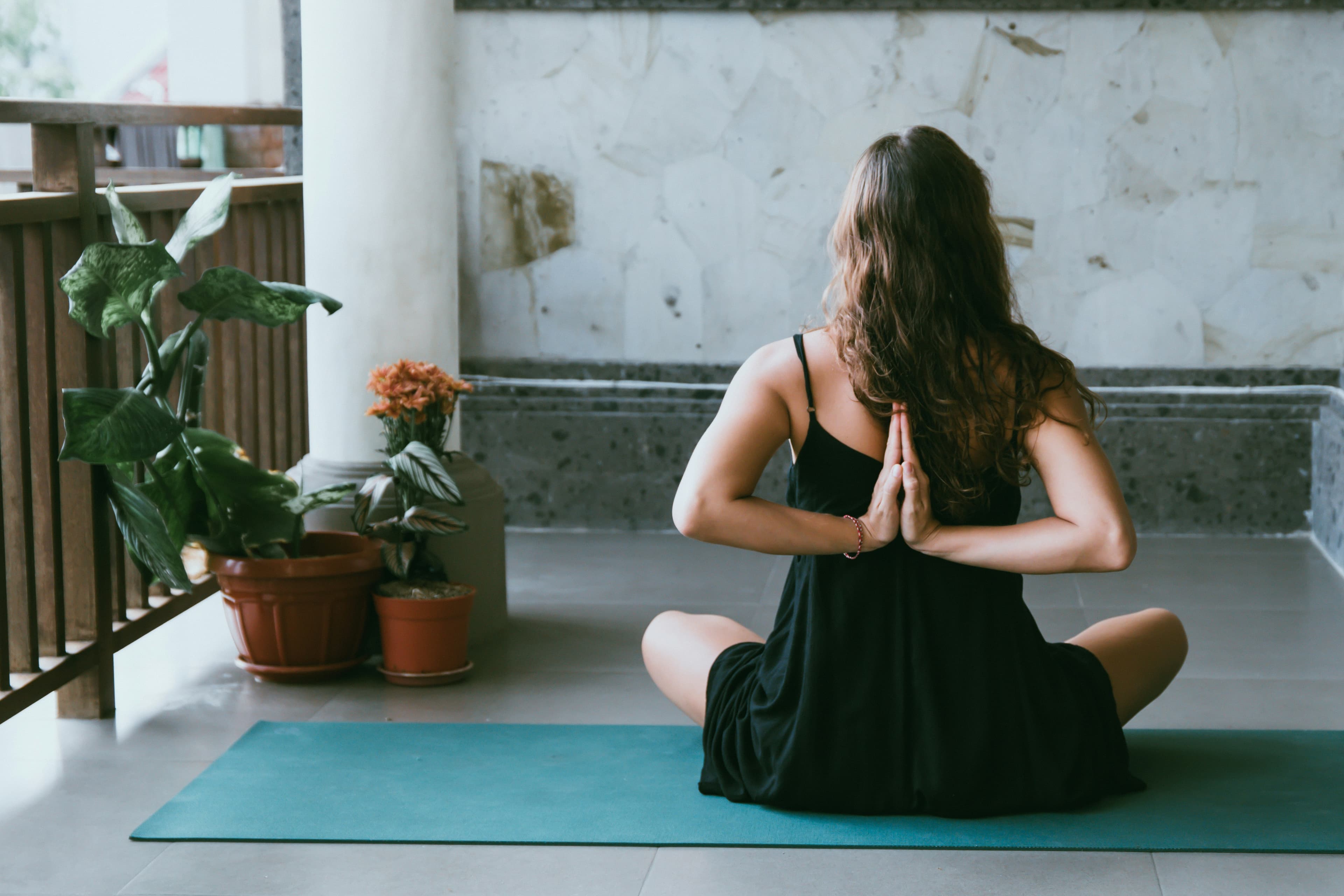 People practicing yoga together in a studio setting
